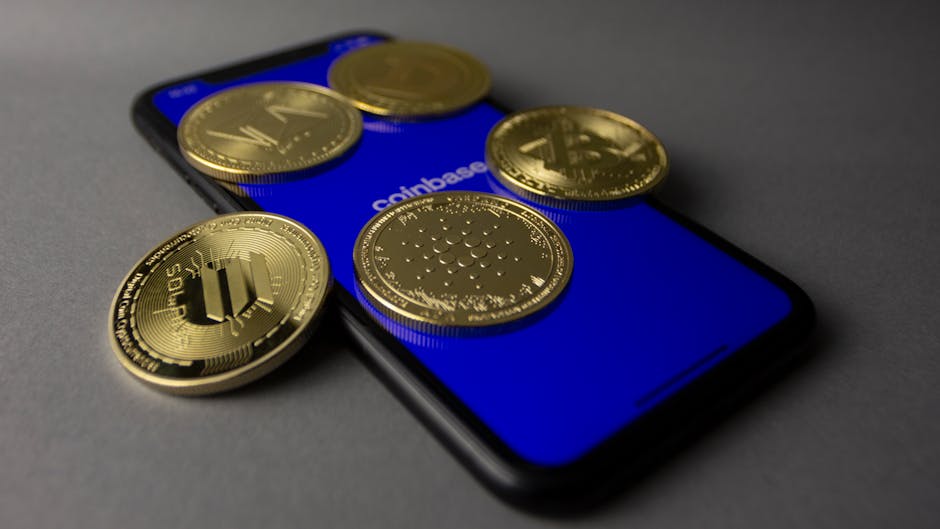 Five cryptocurrency coins displayed on a smartphone with Coinbase app open.